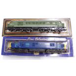 Two 00 gauge model railway diesel locomotives Mainline BR CO-CO Type 4 The Manchester Regiment D49