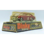 Dinky Toys diecast model Ford Capri Rally Car with metallic red body, black bonnet and racing number