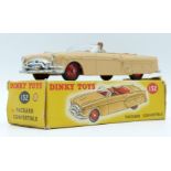 Dinky Toys diecast model Packard Convertible with beige body, driver, red interior and hubs, 132, in