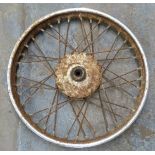 Four motorbike wheels including early British Hub Company