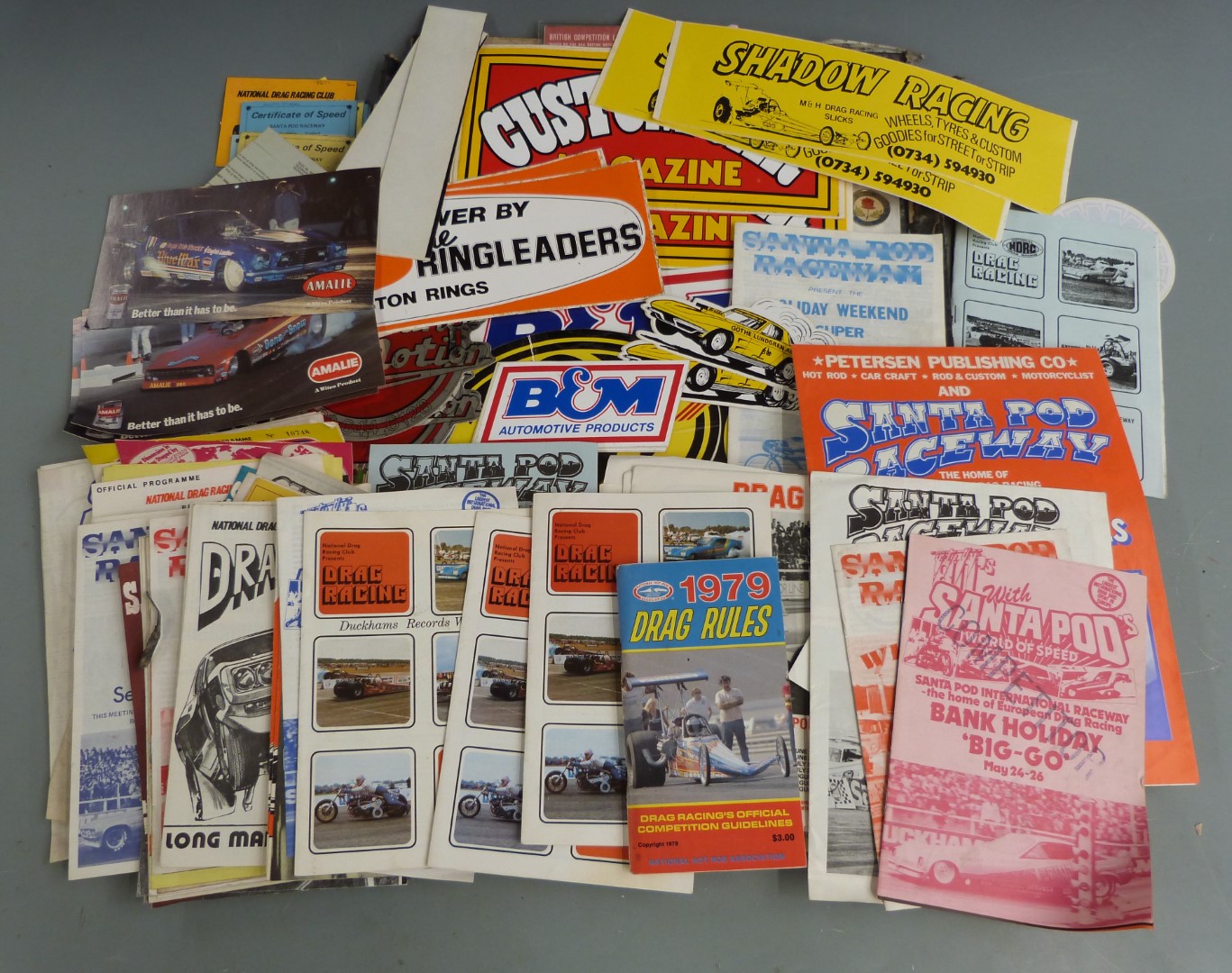 Mainly 1970's drag racing ephemera including Santa Pod Raceway certificates of speed, programmes,