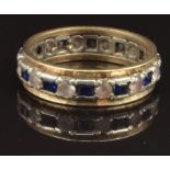 A 9ct gold eternity ring set with sapphires and paste, size Q, 4g