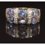 A 9ct gold ring set with diamonds and tanzanites, size L, 4.3g