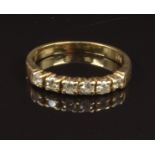 A 9ct gold ring set with cubic zirconia, size K, 1.8g