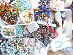 A collection of costume jewellery including vintage necklaces and beads