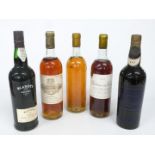 Five bottles of dessert and Madeira wines comprising Chateau Coutet Barsac 1976 73cl, Chateau des