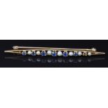 A 10k gold brooch set with alternating sapphires and pearls, 5.5g, 2.7g