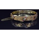 9ct gold bangle set with rose cut diamonds and rubies, Birmingham 1911, 11.6g