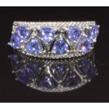 A 9ct white gold ring set with tanzanites and diamonds, size S, 3.5g