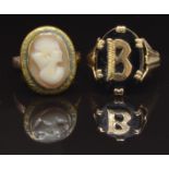 A 9ct gold ring set with a cameo and a 9ct gold ring set with onyx and a gold 'B' , 5.8g