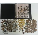 An amateur collection of UK and overseas coins, George II onwards, most in an album, some silver
