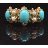 A 9ct gold ring set with seed pearls and faux turquoise, size M, 4.1g