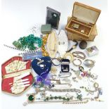 A collection of jewellery including a silver bangle set with an amethyst cabochon, Sekonda watch,