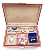 A collection of jewellery including agate brooch, clover brooch, silver locket and chain, silver