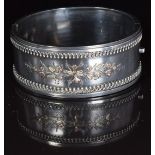 Victorian silver bangle with applied gold foliate decoration, 2.5cm, 30g, internal dimensions 5.5