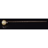 Victorian stick pin set with a rose cut diamond and pearl, 6.5cm, 1.3g