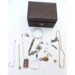 A collection of jewellery including Victorian silver brooch, Victorian locket, silver chains, silver