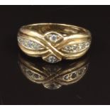 A 9ct gold ring set with cubic zirconia, size O, 3.3g