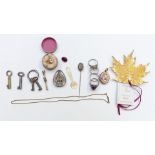 A collection of jewellery including three silver rings, Victorian silver stick pin, Victorian