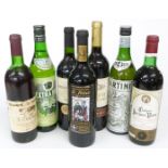 Five bottles of red wine including Chateau Jacques Blanc 1975 73cl, St Petroc 13% vol, Castillo de