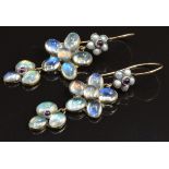 A pair of 9ct gold earrings set with moonstones, pearls and garnets