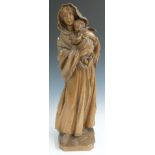 German carved wooden figurine depicting a robed woman with babe in arms, indistinct maker's stamp to