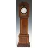 A 19thC watch holder in the form of a longcase clock, 33cm tall