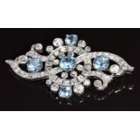 Belle Époque platinum brooch set with five round cut aquamarines and transitional cut diamonds, 5.