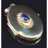 A 9ct gold locket set with a sapphire cabochon, 4.2g