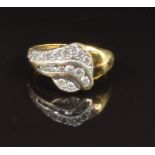 An 18ct gold ring set with cubic zirconia, size Q, 3.8g