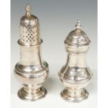 Two Georgian hallmarked silver peppers or small casters, one London 1743, maker David Field the