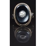 Victorian ring set with onyx and an old cut diamond of approximately 0.4ct, size L, 6g in Asprey