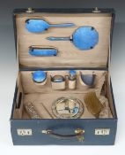 Blue leather travelling vanity case with fitted interior and blue guilloché enamel mounted