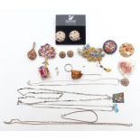 A collection of jewellery including Swarovski earrings, Luctie and micromosaic brooches, silver