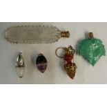 Scent bottles comprising cut glass example with gilt metal lid, length 11.5cm, egg shaped example,