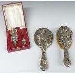 Cased hallmarked silver egg cup, napkin ring and spoon set, weight 110g, together with a