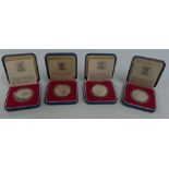 Four cased Royal Mint Royal Commemorative silver crowns for 1977 and 1978 Guernsey, Gibraltar,