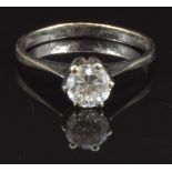 An 18ct white gold ring set with a round cut diamond of approximately 0.7ct, size Q, 2.9g