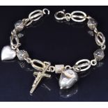 A 9ct gold charm bracelet, 11.3g