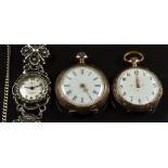 Two silver keyless winding open faced pocket watches, both with gold hands and engraved