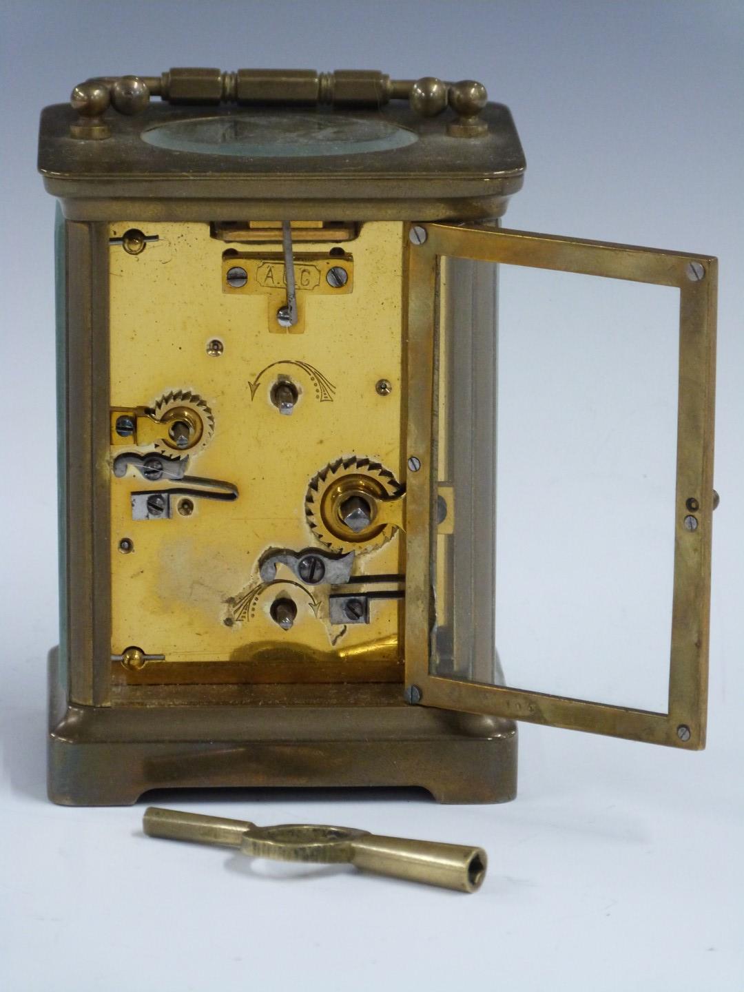 Brass carriage clock with alarm function, stamped ACG inside with Roman numerals to the enamelled - Image 5 of 6