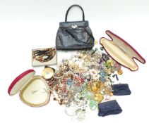 A collection of jewellery including beaded, amethyst  and pearl necklaces, vintage brooches,