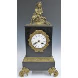 French figural slate mantel clock on ormolu feet, the enamel Roman dial with steel hands, the two