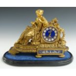 Vincenti & Cie 19thC French figural brass ormolu mantel clock, the female seated figure dressed in