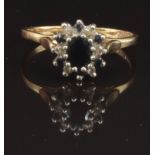 A 9ct gold ring set with sapphires and diamonds, size M, 2g
