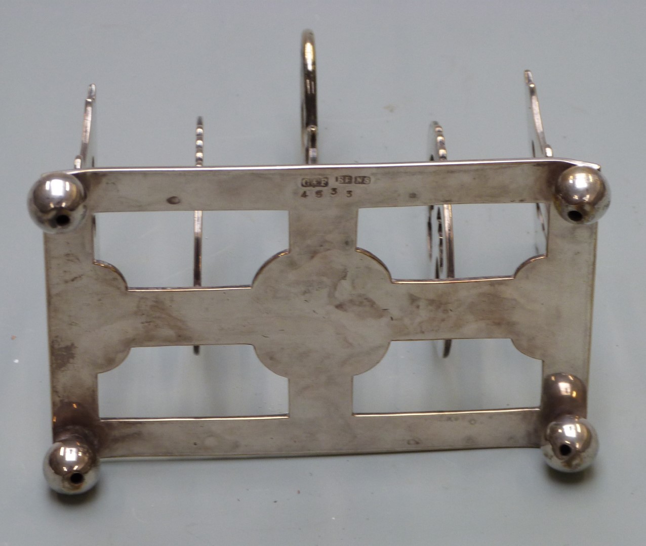 Silver plated toast rack with the bars formed as the word toast, length 12cm - Image 5 of 5