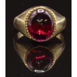 A 9ct gold ring set with a synthetic ruby cabochon, size N, 4.4g