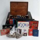 A large collection of UK coinage including collectable £2, 50p etc and some redeemable examples,