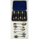 Cased set of six hallmarked silver teaspoons and further loose hallmarked and white metal spoons,