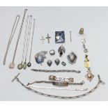 A collection of jewellery including Siam silver brooches, earrings, necklace, Victorian silver